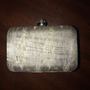 Alexia Crawford gray lace clutch with chain